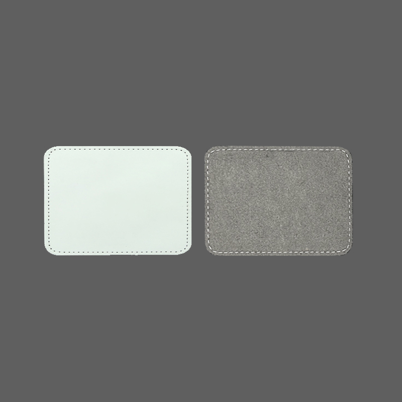 Patchs rectangulaires en similicuir par sublimation de 3 1/2' x 2 1/2' avec adhésif