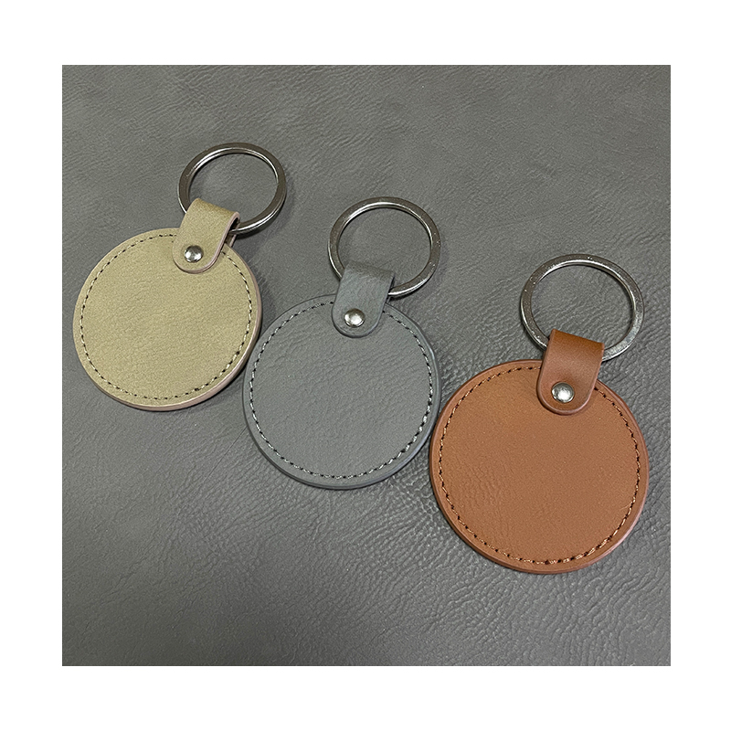 Porte-clés ronds en similicuir laserable avec bord huilé