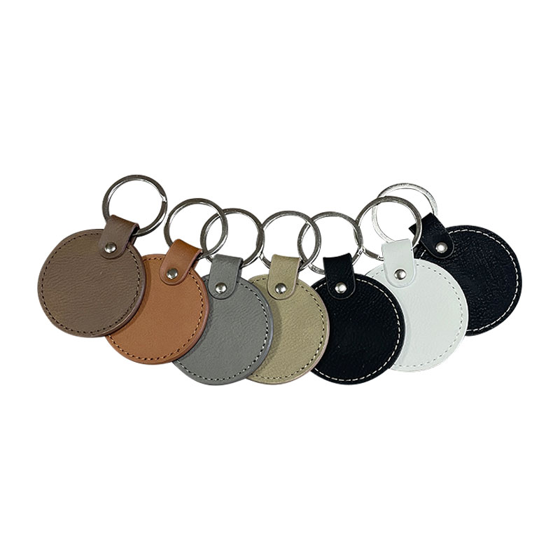 Porte-clés ronds en similicuir laserable avec bord huilé