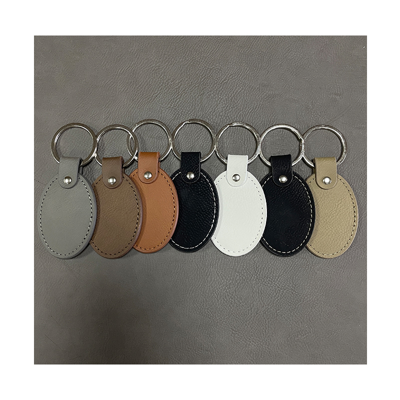 Porte-clés ovales en similicuir laser avec bord huilé