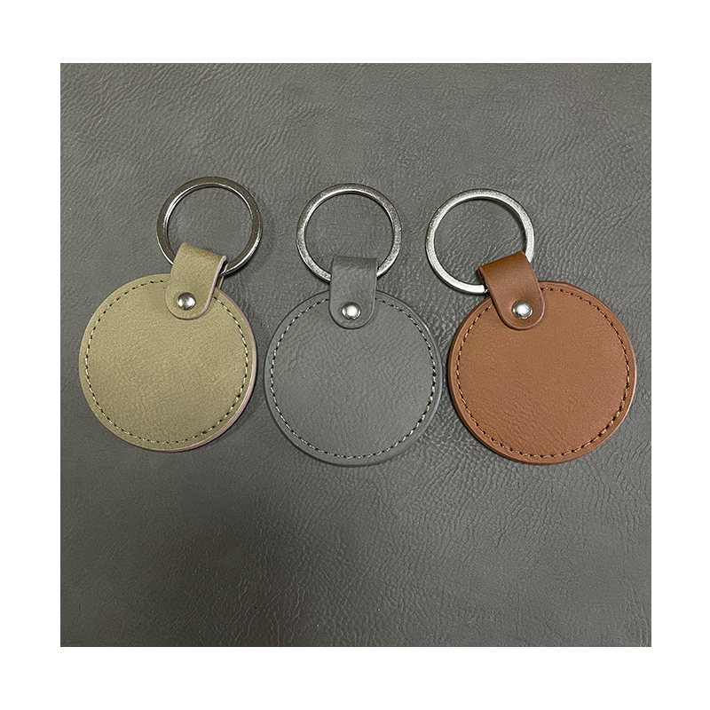 Porte-clés ronds en similicuir laserable avec bord huilé