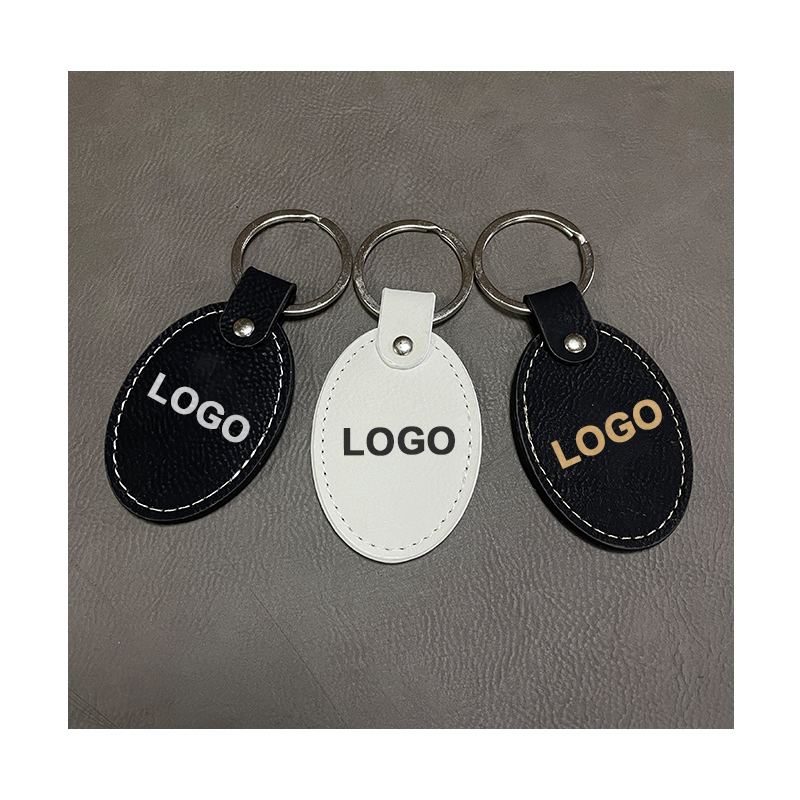 Porte-clés ovales en similicuir laser avec bord huilé