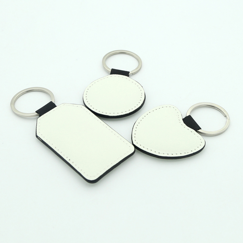 Porte-clés rond en cuir Pu par sublimation - Impression double face Porte-clés rond en cuir Pu par sublimation - Impression double face